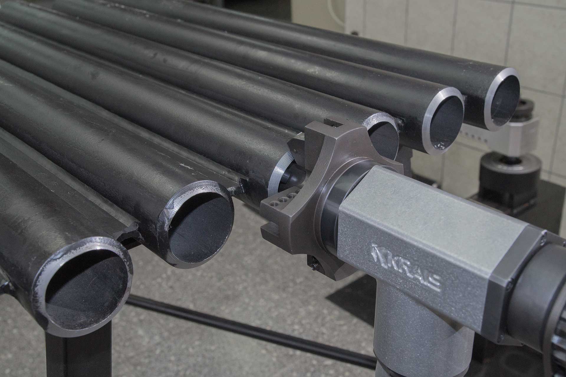 Fast, solid tube facing and beveling machines